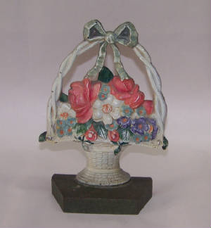 ANTIQUE FLOWER BASKET DOORSTOP