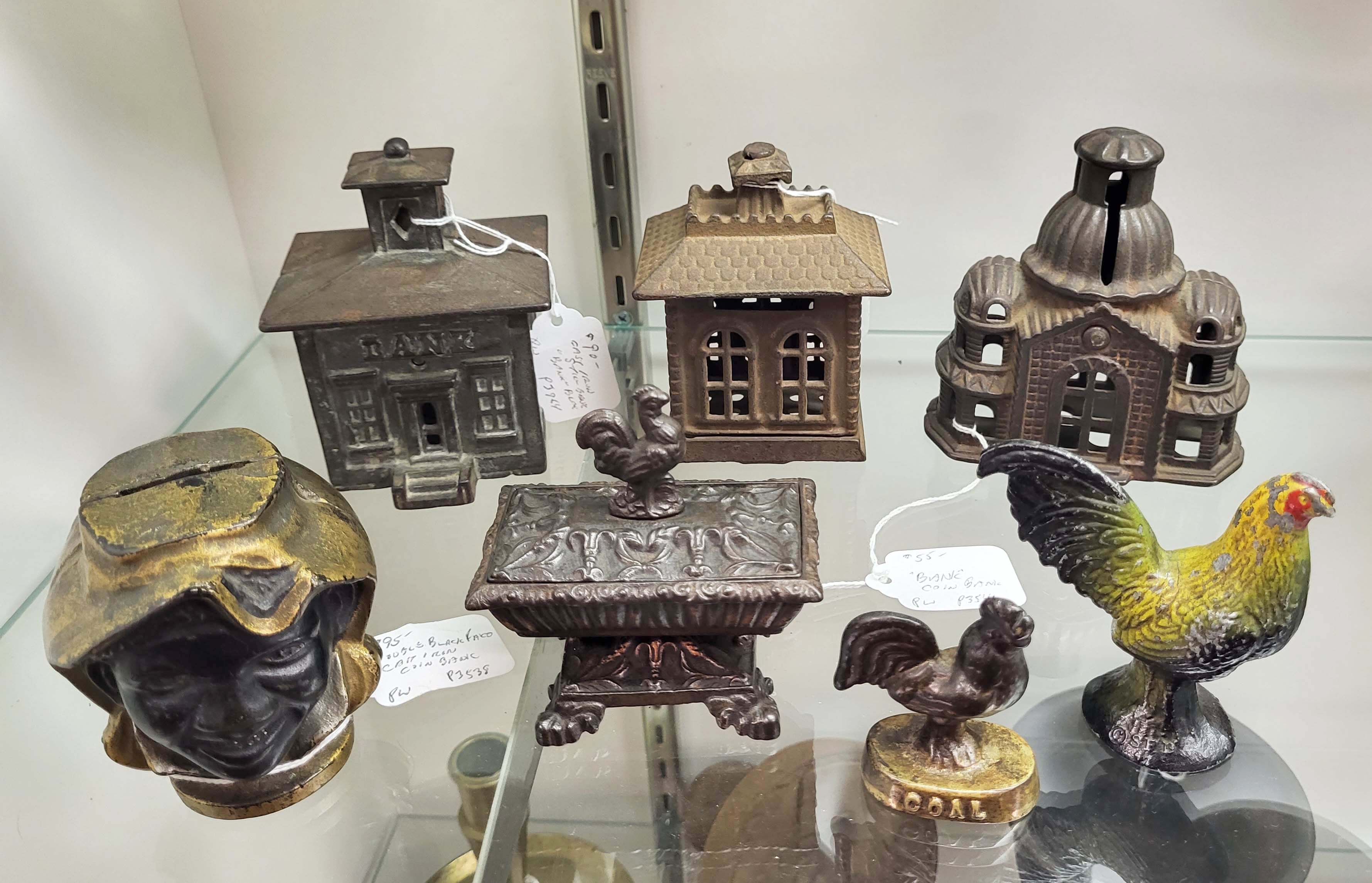 CAST IRON BANKS AND PAPERWEIGHTS